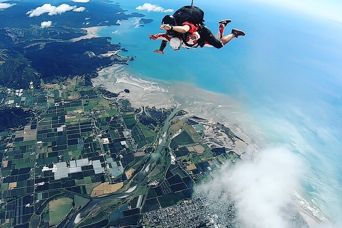 18,000ft Tandem Skydive over Abel Tasman - The Jump and Freefall: Up to 80 Seconds of Pure Adrenaline
