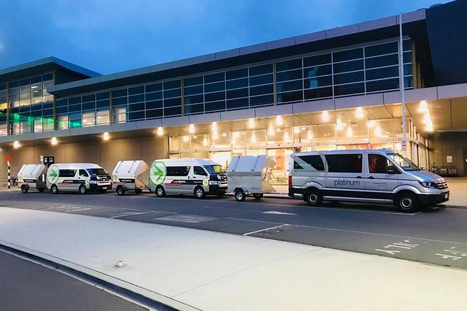 Arrival Transfer: Auckland Airport to Auckland Central City Centre - Shared Ride Logistics: Modern Vans, Small Group, Real Timing