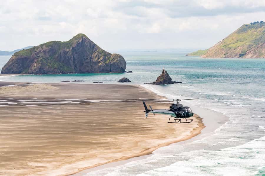 Auckland: 36 min scenic helicopter flight - Coast to Coast - Bethells (Te Henga) Beach and the black sand coastline from the sky