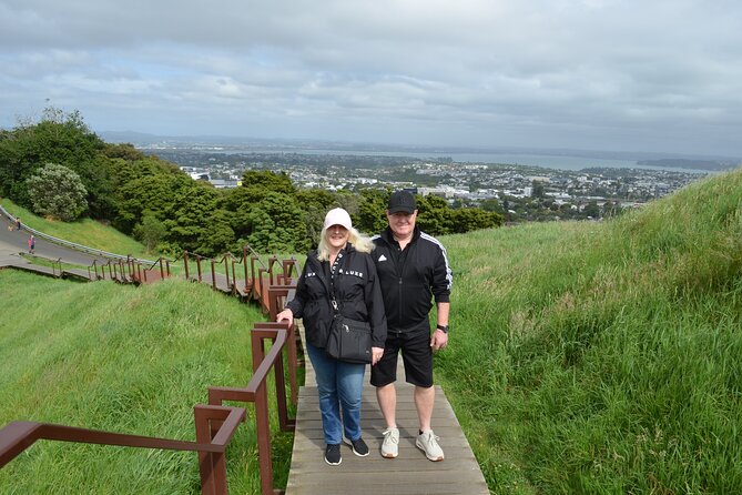 Auckland Highlights Full Day Guided Tour - Mission Bay to MJ Savage, beach vibes plus a harbor view