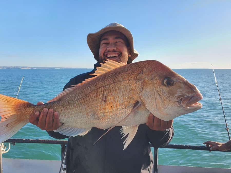 Auckland: Twilight Fishing Charter 5pm - 9:30pm - The Boat, Gear, and Crew Style You’ll Want on a Charter