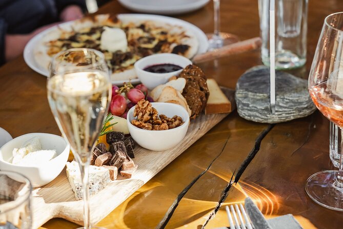 Award Winning Premium Wine Tour Queenstown Tasting at 4 Wineries - Stop 2: Kinross Cellar Door and Cottages for Label Variety