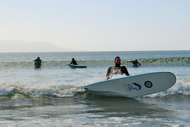 Beginner Surf Lesson at Te Arai Beach - Getting into the water, first wave coaching without the drama