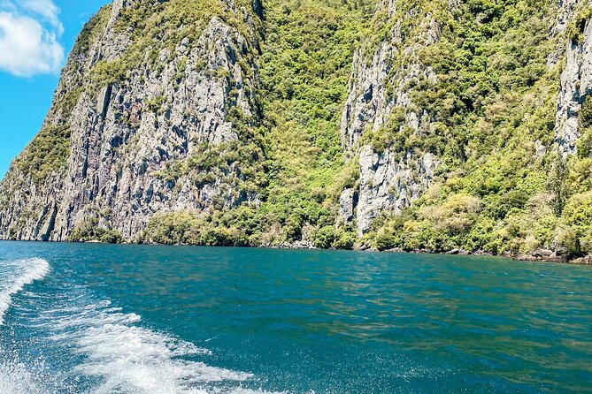 Chasing Waterfalls The Adventurer from Kinloch Marina - Stop 2: Karangahape Cliffs, a fast but memorable marker