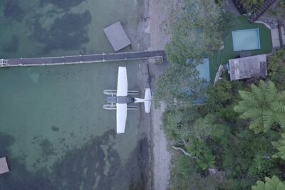 Crater Lakes Scenic Flight with Natural Hot Pool Bathing by Floatplane