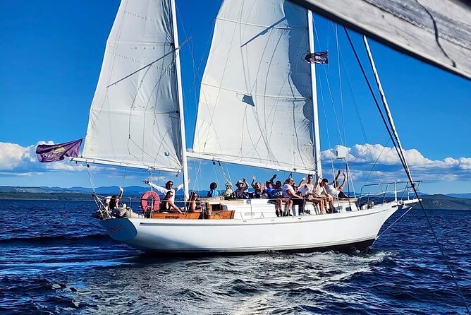 Evening Eco Sailing Adventure to Māori Rock Carvings Lake Taupō - What you get on board: ponchos, towels, music, and a crew that runs the mood