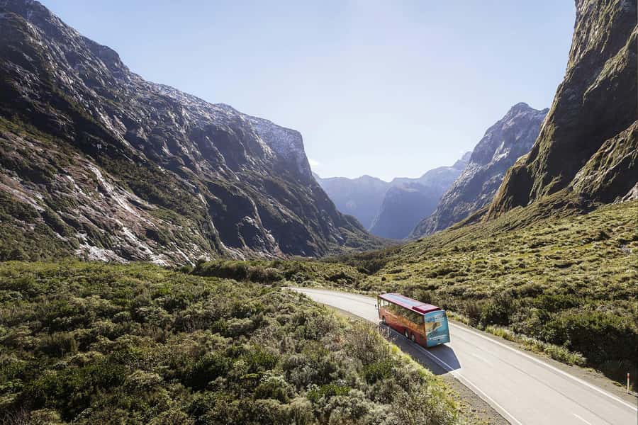 From Queenstown: Milford Sound Coach, Cruise, Scenic Flight - Milford Road coach ride: comfort, charging, and quick walking stops