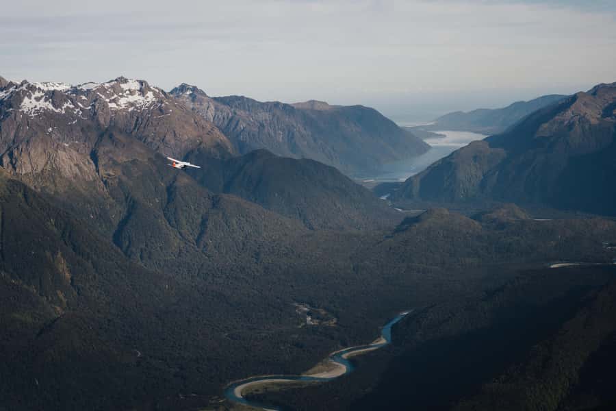 From Queenstown: Milford Sound Full-Day Trip by Plane & Boat - Cruise highlights that matter: Mitre Peak, Bowen Falls, Seal Rock, and Stirling Falls