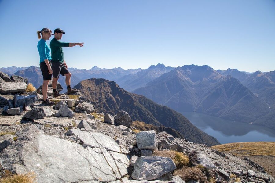 From Te Anau: Full Day Kepler Track Guided Heli-Hike - Water taxi across Lake Te Anau: the calm ending after big walking