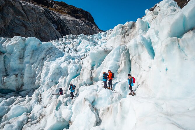 Heli Hike Fox Glacier - The glacier walk itself: crampons, stairs, and photo time