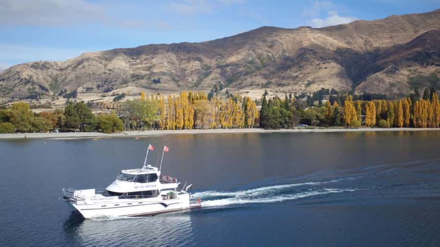 Lake Wanaka Happy Hour Cruise - The scenery payoff: how the lake view changes once you are out there