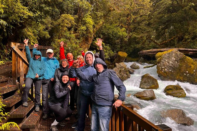 Milford Sound Full Day Tour from Te Anau with Cruise - Mirror Lakes boardwalk and the Earl Mountains backdrop