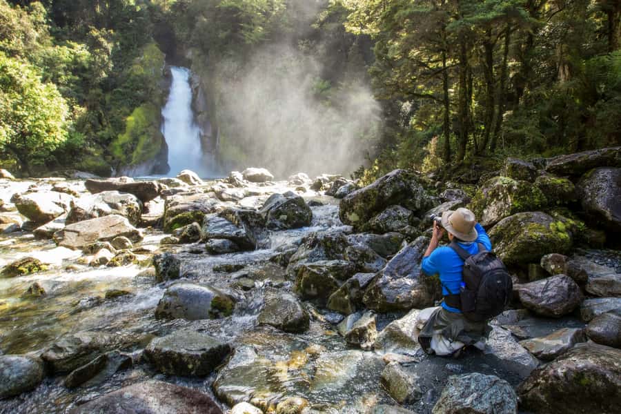 Milford Track: Full Day Guided Hike and Nature Cruise - Water taxis, visitor center tea, and the reset before the cruise