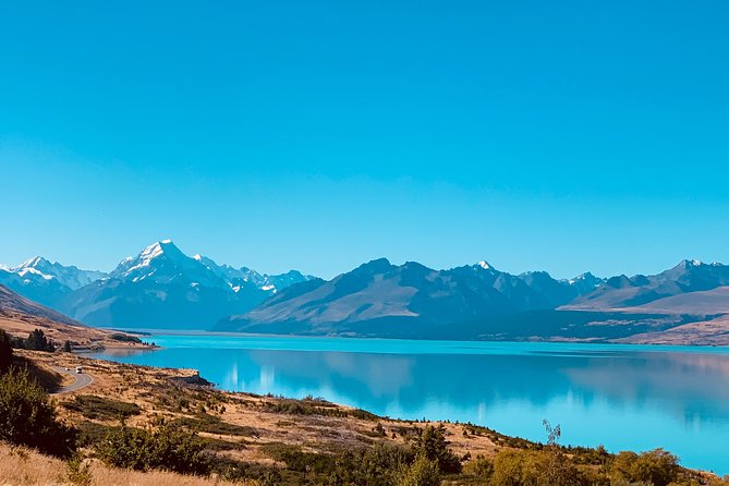 Mount Cook, Lake Tekapo and Tasman Glacier Tour from Christchurch - Lake Tekapo: Good Shepherd Church, sheepdog statue, and that unreal color