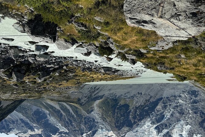 Mt. Cook Full Day Group Tour via Tekapo from Christchurch - Lake Pukaki: turquoise color, Mt Cook views, and visitor centre timing