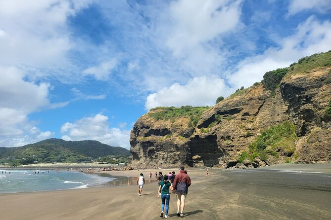 Private Auckland West Coast Tour Piha Beach and Karekare Falls - Piha Beach: black sand, swimming, surfing, and photo time