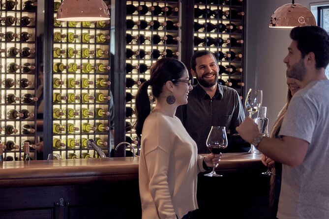 Queenstown Afternoon Wine Tour - Peregrine | Kinross | Amisfield - Stop 2: Peregrine Wines, the wing-shaped design and the Pinot style