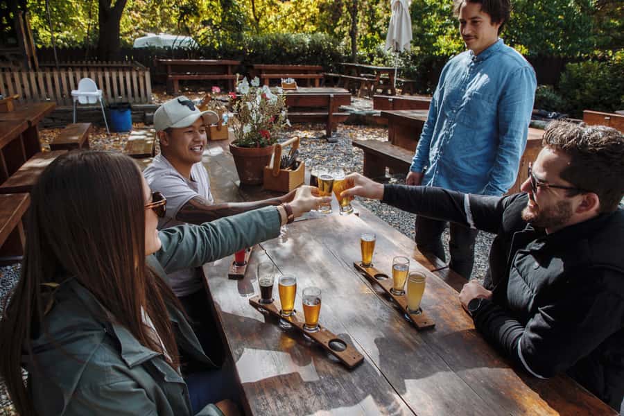 Queenstown: Craft Beer Brewery Tour with Lunch - Meeting the guide and settling in with hotel pickup