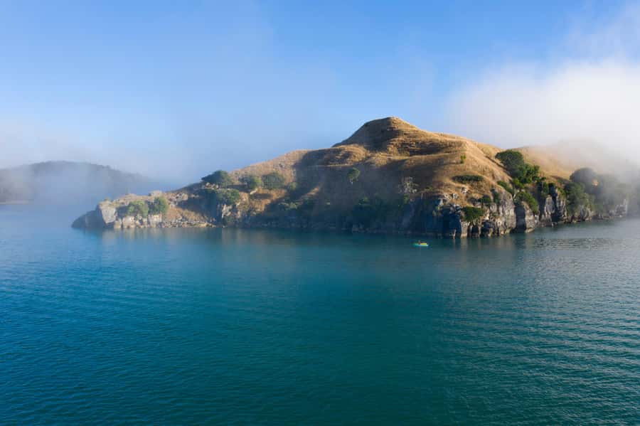 Raglan: Scenic Harbour Sunset Cruise - Māori pā sites and harbour stories you can actually follow
