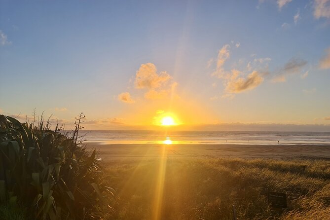 Romantic Auckland Sunset tour with Winery & Thermal pool - Muriwai Beach at sunset: the West Coast payoff
