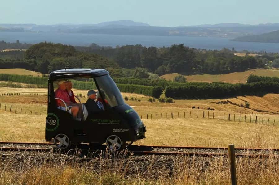 Rotorua Railcruising: Self-Drive Rail Car with Audio Guide - What you see: Lake Rotorua and Mount Tarawera from moving windows