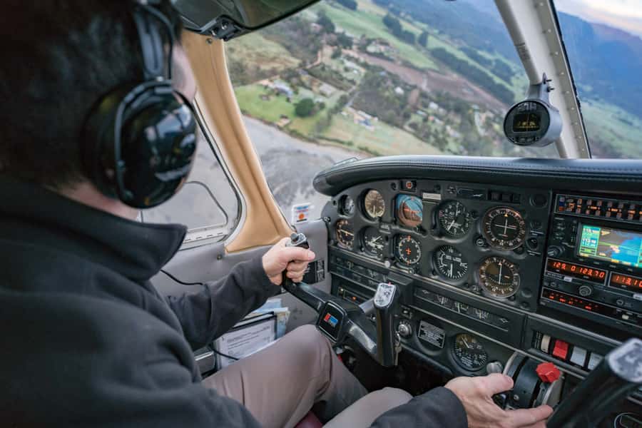 Takaka: Farewell Spit/Abel Tasman Scenic Flight - Wharariki Sea Arches: the sky makes sense of the shapes