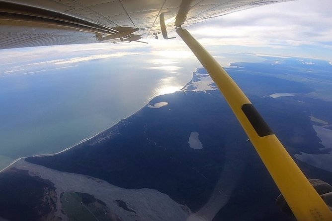 Tandem Skydive 18,000ft from Franz Josef - The flight up: Aoraki, glaciers, sea, and river braids