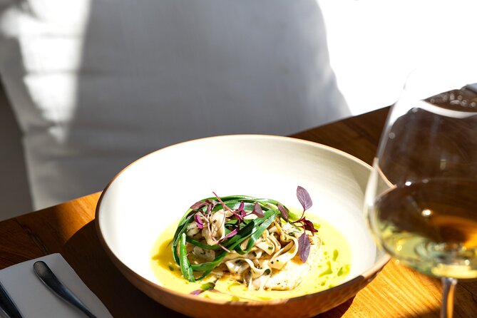 Waiheke Island: Afternoon Wine Affair with Ocean Front Lunch - Mudbrick Vineyard in Oneroa, Rangitoto, Auckland views, and wedding gardens