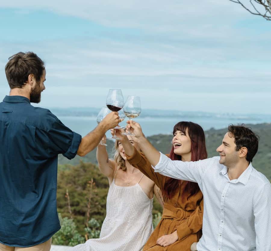 Waiheke Island: Scenic Island Wine Tour & Local Wine Tasting - Oneroa Village and the beach walk on the double-decker tour