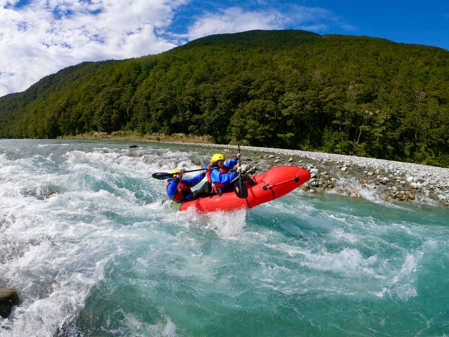 Wanaka: Full-Day Guided Packrafting Tour with Lunch - Lunch by the riverbank, then turquoise swimming holes